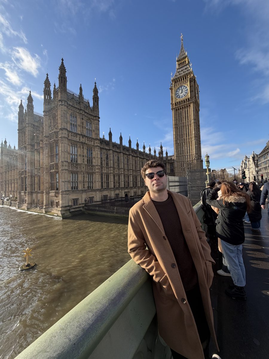 Andrew Ehlert on Westminster Bridge, London, with the Houses of Parliament behind